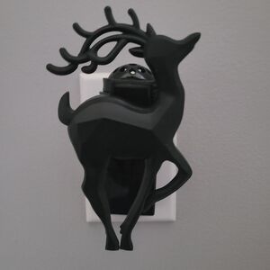 Used BBW Wallflower fragrance plug-in.  Decorative black deer
